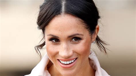 Meghan Markle cuts elegant silhouette in £1.8k trench 